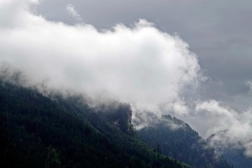 a foggy and rainy day in the mountains
