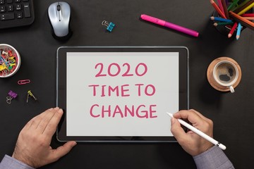 2020, New Year, Time to Change Concept on Digital Tablet