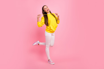 Full length body size photo of charming cute beautiful attractive nice pretty girlfriend wearing yellow sweater while isolated over pastel color background