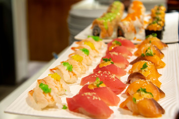  sushi roll on a white plate