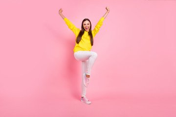 Fototapeta na wymiar Full length body size photo of charming cute attractive nice pretty sweet lovely girlfriend raising her leg like jumping rejoicing with sales wearing yellow hoodie isolated with pastel color