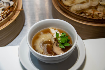  shark fin soup in white cup