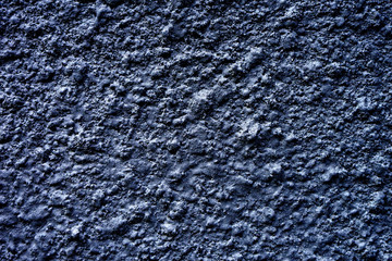 Stippled cement rough texture wall background,   dark grey .   