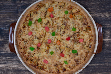 Homemade organic apple pie dessert ready to eat, close up. Apple tart with walnut. Close up