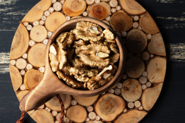 Walnuts brain and nuts whole in wooden caps.  