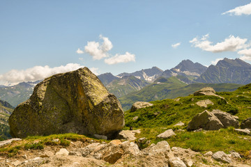 Scenic view of the Italian Alps from a rocky slope of the massif of Mont Blanc in summer, Courmayeur, Aosta Valley, Italy 