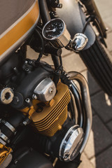 The bottom location of the speedometer on the motorcycle engine