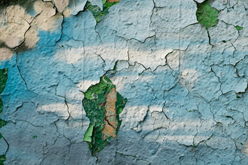 Wall painted with green, white and blue paint, texture