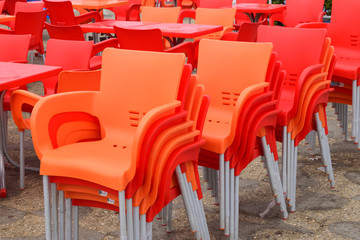 empty chairs of plastic in row  due the coronavirus 