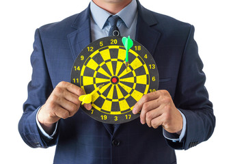 Young man holding a dart board in his hands, the idea of rivalry in business, on a white background