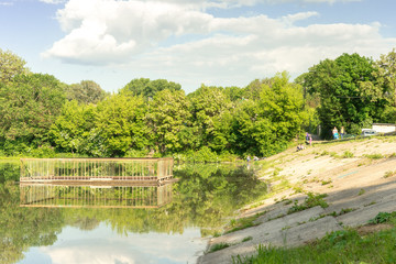 Fototapeta premium lake with a dam and a lock in the forest