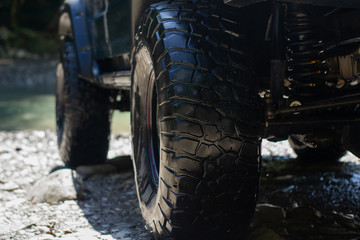 Off road car suspension. Wheel of the off-road pickup - obrazy, fototapety, plakaty