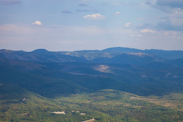 Obraz premium Beautiful view of the mountain peaks on a summer day.