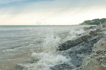 waves crashing on the rocks