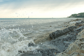 waves crashing on the rocks