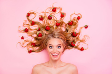 Close up top above high angle view photo beautiful very glad she her lady lying down among fruits strawberries long hair yummy tasty useful full vitamins complex salon isolated pink background