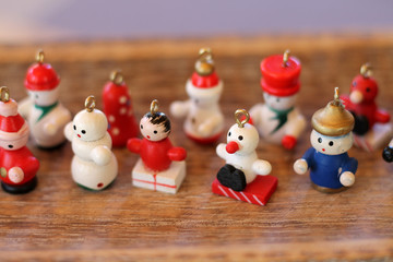 Traditional european christmas toy on wooden background close up.