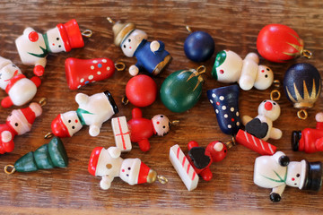 Traditional european christmas toy on wooden background close up.