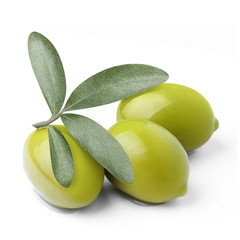 Delicious green olives with leaves, isolated on white background