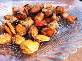 Grilled mussels on a plate
