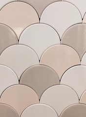 Obraz premium real photo of white, beige gray tiles Seamless surface design with fish scales ornament. Oriental traditional pattern with repeated mosaic. Tracery window wallpaper. 