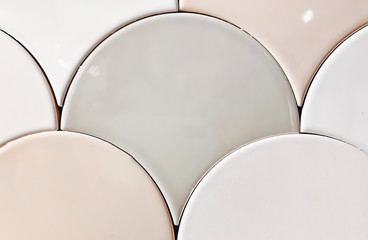 real photo of white, beige gray tiles Seamless surface design with fish scales ornament. Oriental traditional pattern with repeated mosaic. Tracery window wallpaper.  © Алена Ган