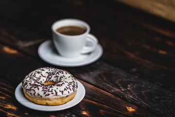 White donut with chocolate sprinkle