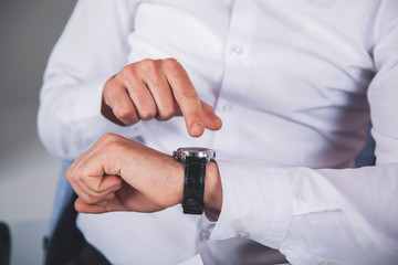 business man hand watch