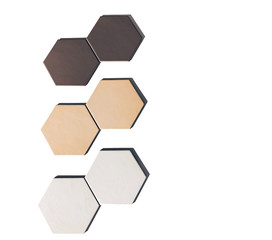 real photo:  set of white beige, brown hexagonal tiles wall of the bathroom