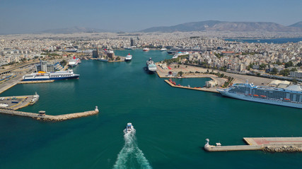 Aerial drone panoramic photo of busy port of Piraeus, the largest in Greece and one of the largest passenger ports in Europe, Attica, Greece 