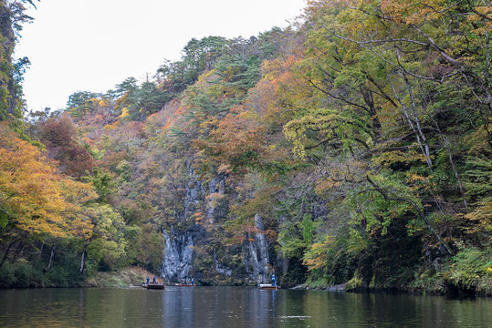 Geibikei Gorge River Cruises in Autumn foliage season. Beautiful scenery landscapes view in sunny weather day. Ichinoseki, Iwate Prefecture, Japan