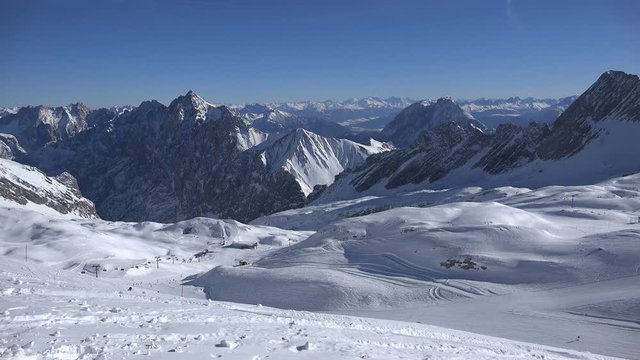 The lower part of the ski resort Zugspitze as seen from the Zugspitzplatt, central hub for all skiing lifts and the Zugspitz train glacier station.