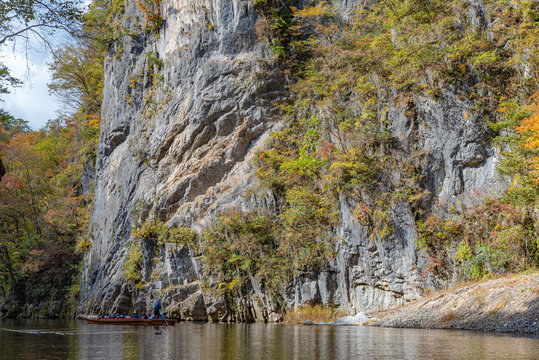 Geibikei Gorge River Cruises in Autumn foliage season. Beautiful scenery landscapes view in sunny weather day. Ichinoseki, Iwate Prefecture, Japan