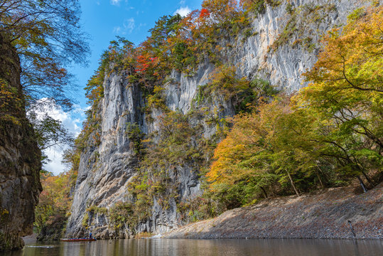 Geibikei Gorge River Cruises in Autumn foliage season. Beautiful scenery landscapes view in sunny weather day. Ichinoseki, Iwate Prefecture, Japan