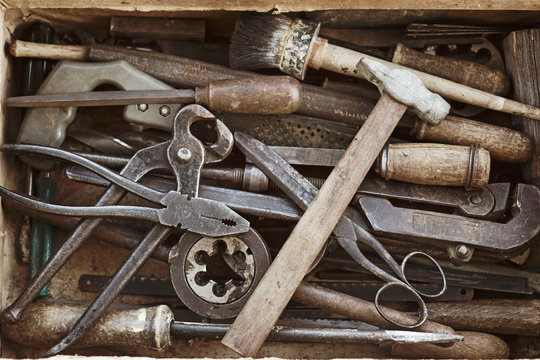 Box with the different old hand tools