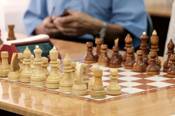 Chess, Board game. The game concept. Developing the abilities of using old games. People of...