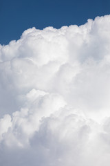 Fluffy cloud edge and blue sky