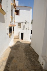 Narrow alley in Andalusian village, Casares, Andalusia, Spain