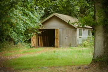 Wooden shed in the woods
