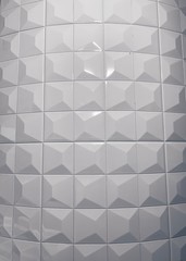 real photo of white ceramic tile shaded abstract geometric pattern. Origami paper style. 3D wall design rendering background