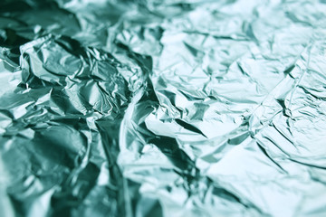 Wrinkled foil silver background texture