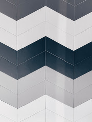 real photo of colored hexagonal glazed porcelain background tile wall mounted of the bathroom. Glossy surface. Non-rectified land. Irregular shape Non-repeating pattern