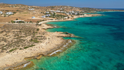 Obraz premium Aerial drone top view photo of beautiful volcanic rocky seascape with turquoise waters, Koufonisi island, small Cyclades, Greece
