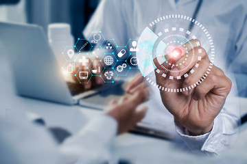 Doctor hands with a touch screen interface