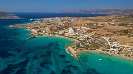 Obraz premium Aerial drone top view photo of beautiful volcanic rocky seascape with turquoise waters, Koufonisi island, small Cyclades, Greece