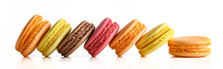Fresh french macaroons on a white background.Set of colored macaroons on a white background in a line.