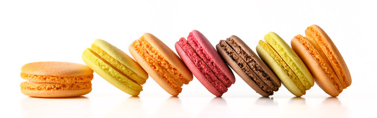 Fresh french macaroons on a white background.Set of colored macaroons on a white background in a line.