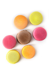 Set of colorful macaroons on isolated white background. Top view. Fresh multicolor macaroons.