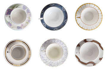 Antique porcelain tableware for tea on a white background