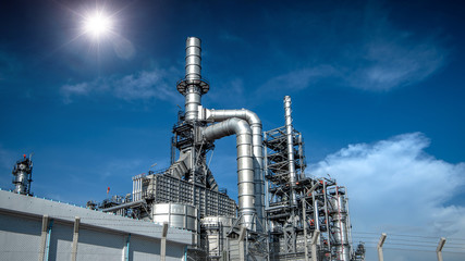Close up Industrial view at oil refinery plant form industry zone with cloudy sky